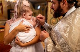newborn baby baptism in holy water infant bathe