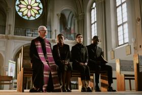 Pastor and Sorrowful Parishioners in Church