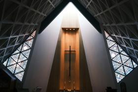Quiet Moment Before the Altar