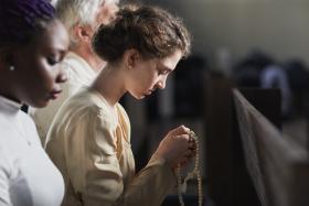 Woman praying in the church